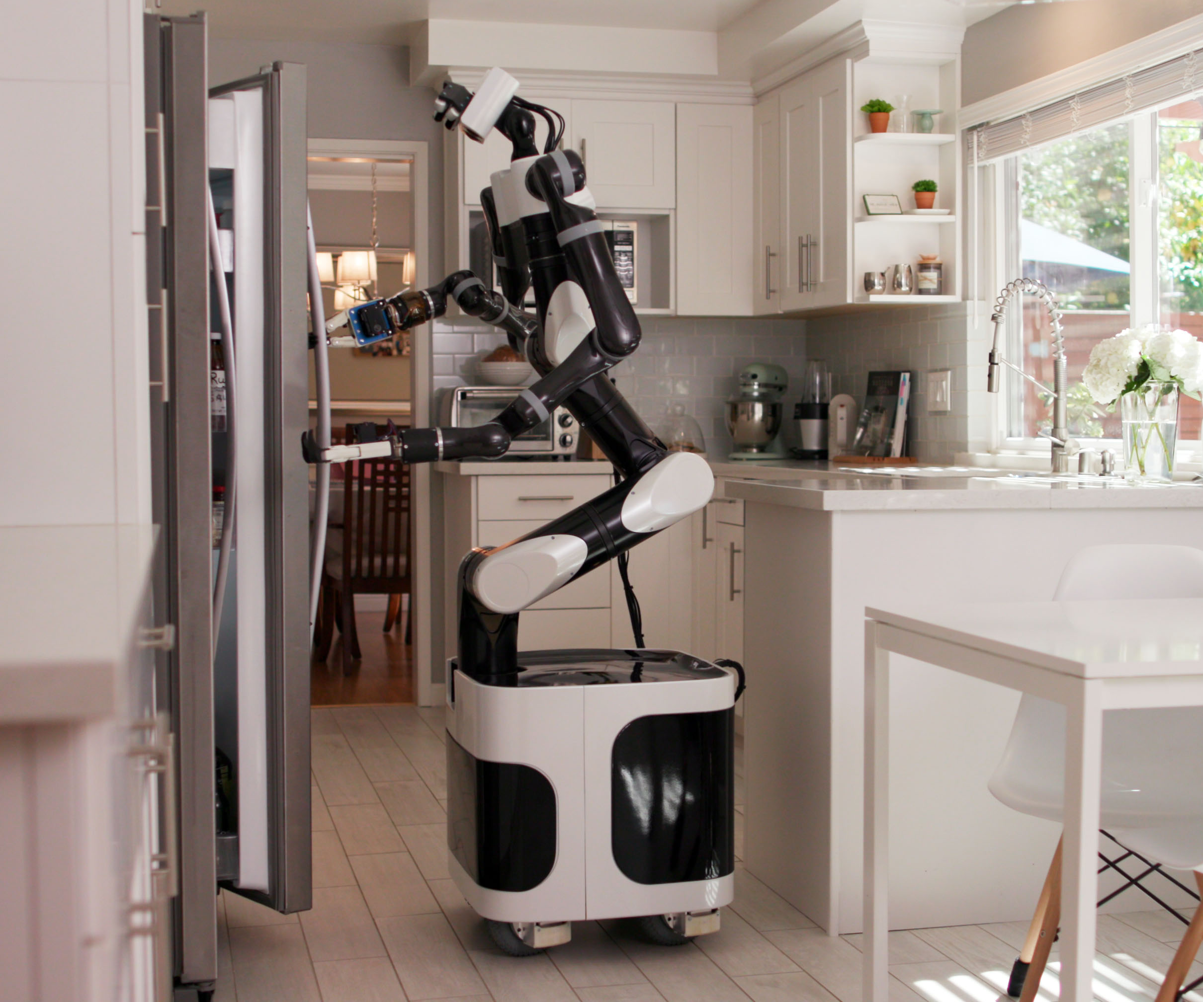 TRI Teaching Robots to Help People in their Homes