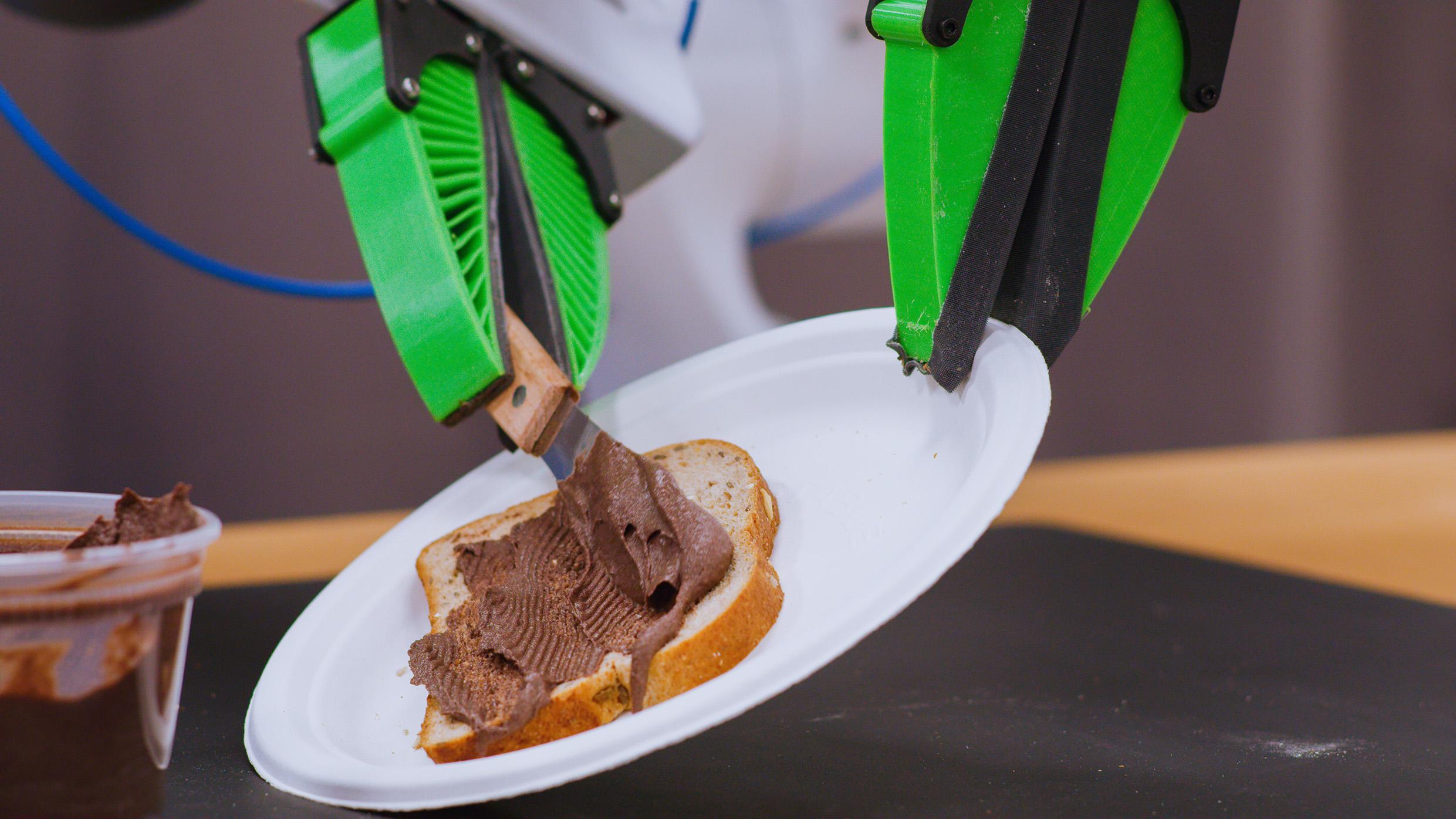 robotics diffusion policy spreading on bread