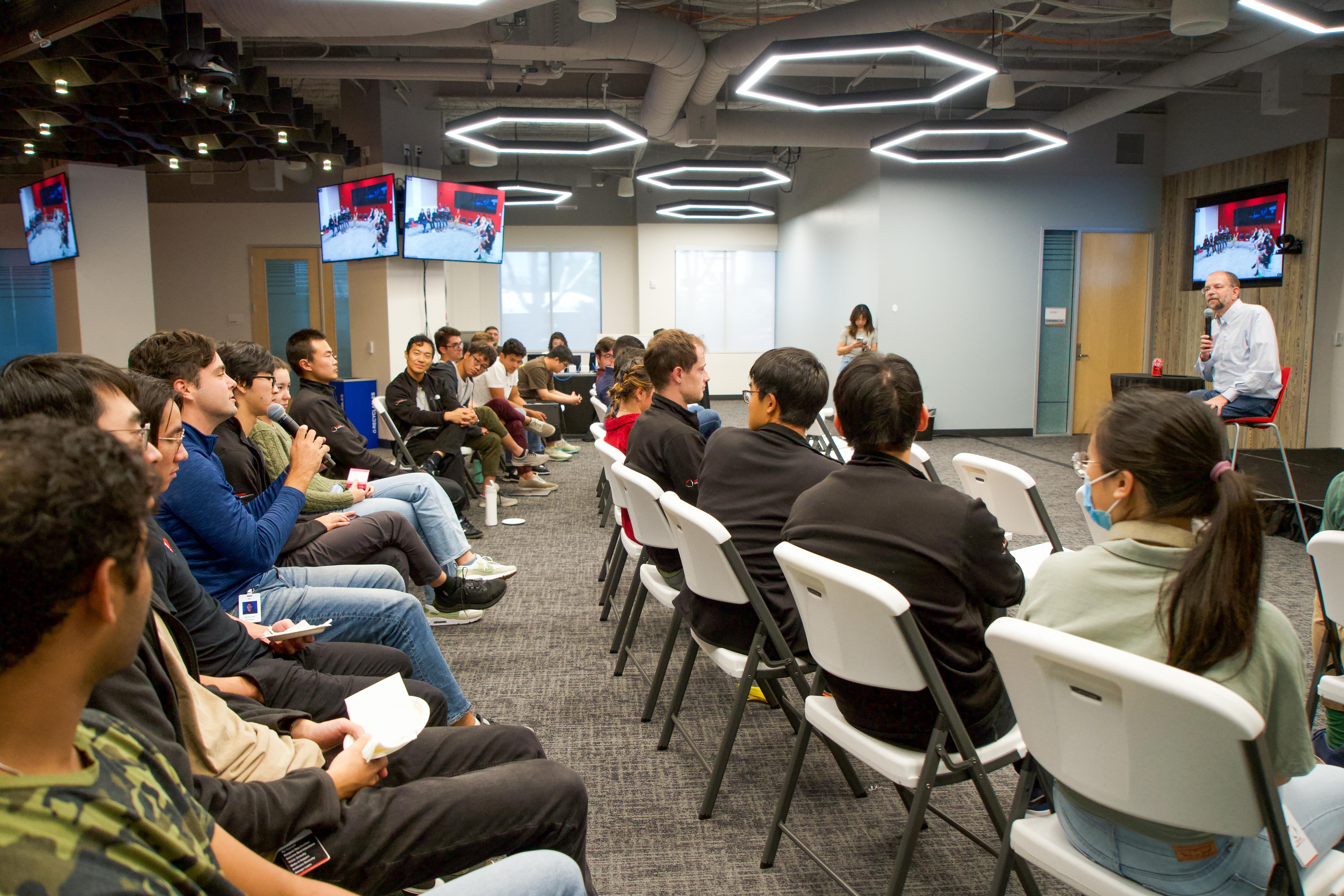 Interns asking Gill Pratt questions