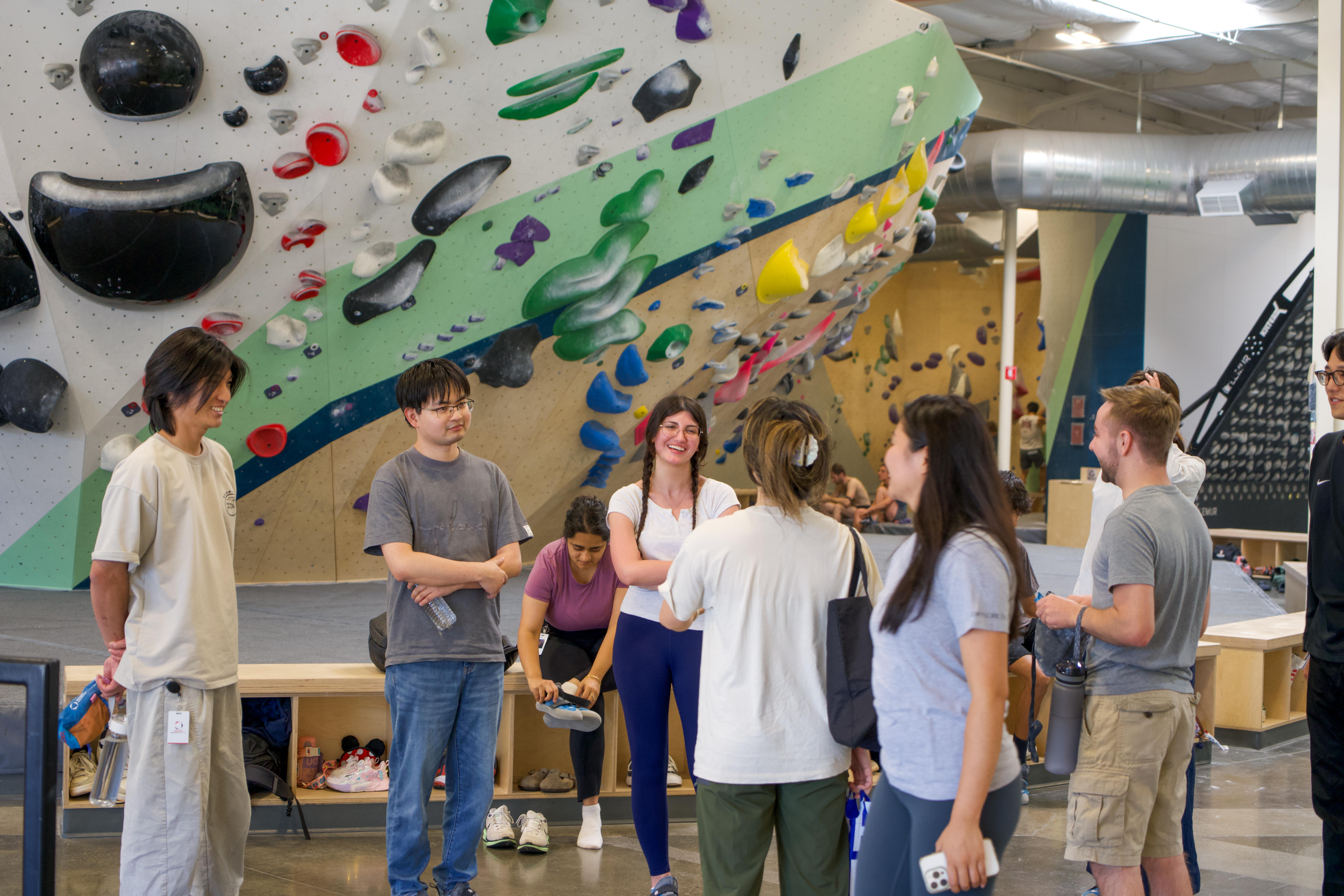 Interns rock climbing